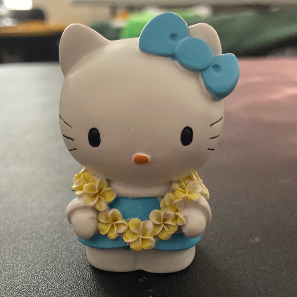 Hello Kitty Figurine with Blue Dress and Yellow Flowers